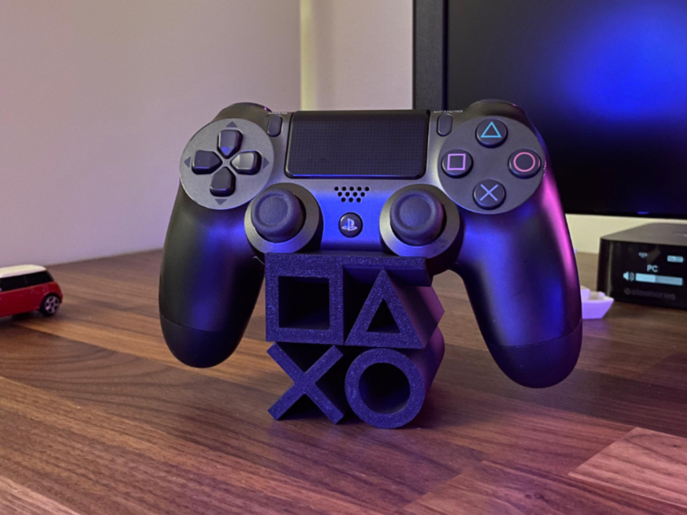 Suporte Decorativo para Comando PlayStation – Estilo Gamer Icónico 🎮